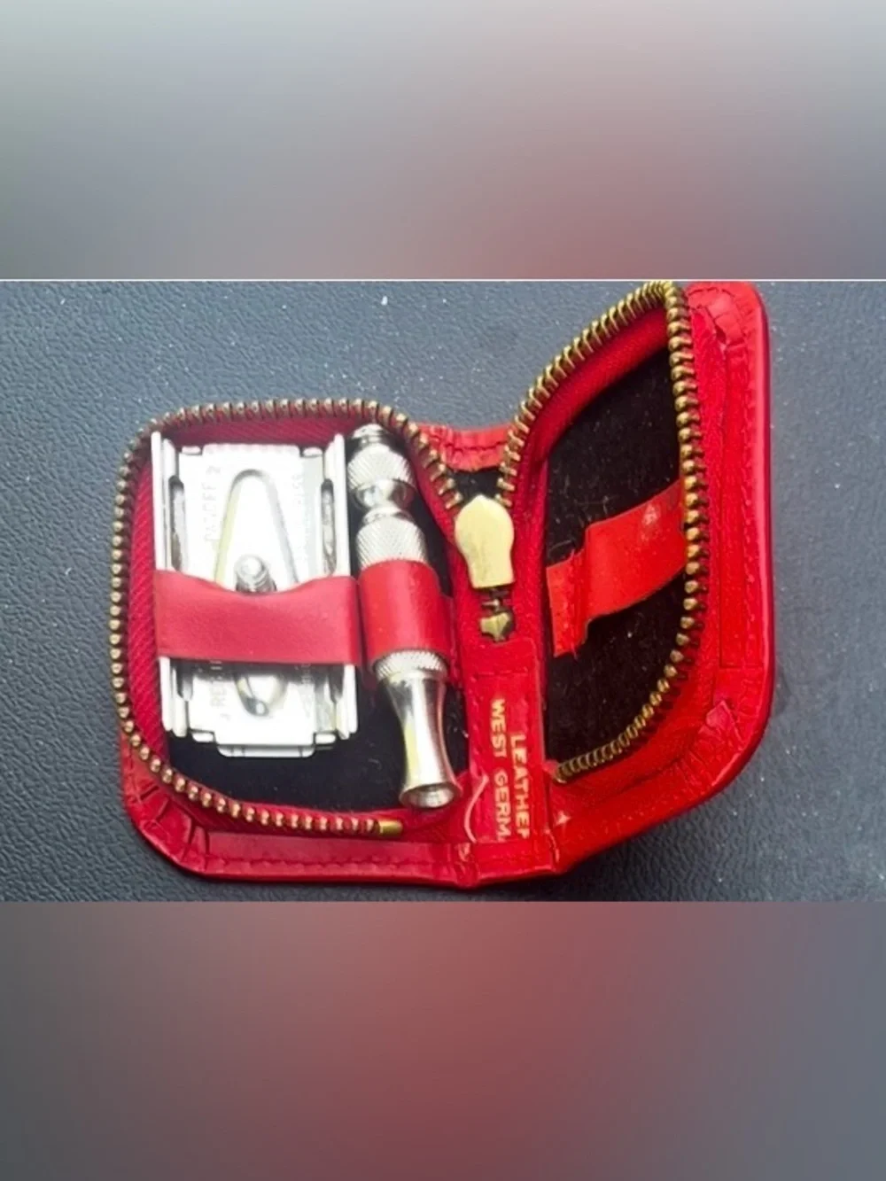 Vintage red Gillette travel safety razor kit